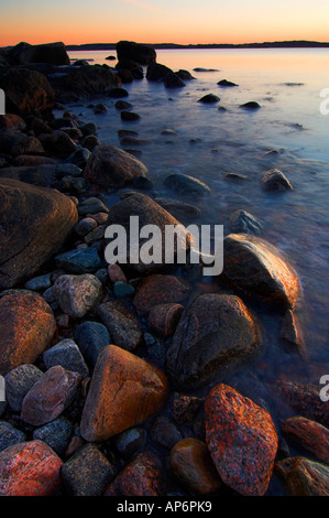 Paysage côtier au coucher du soleil. Västerskog Särö, Halland, Suède Banque D'Images