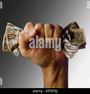 L'argent d'écrasement Fist Banque D'Images