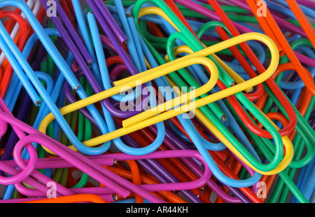 Extreme close up of multi colored trombones Banque D'Images