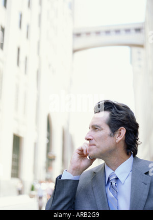 Businessman Using Cellular Phone Banque D'Images