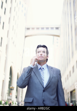 Businessman Using Cellular Phone Banque D'Images