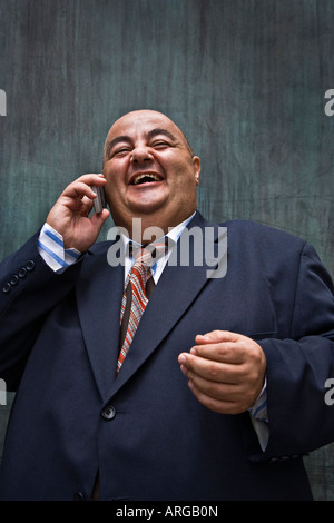 Businessman Using Cellular Phone Banque D'Images