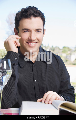 Portrait of Man with Book Banque D'Images