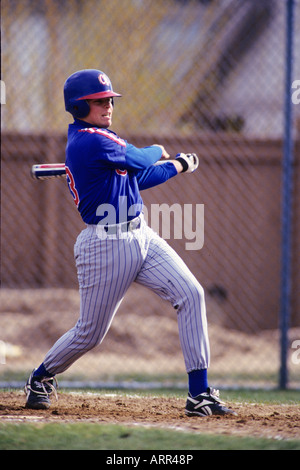 Au bâton de baseball en action Banque D'Images