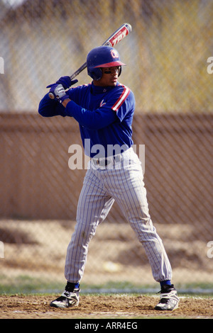 Au bâton de baseball en action Banque D'Images