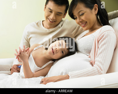 Femme enceinte et sa famille Banque D'Images