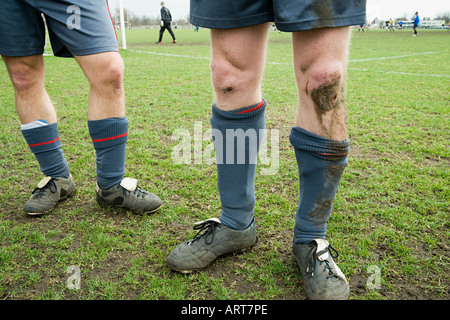 Les jambes de footballeurs Banque D'Images