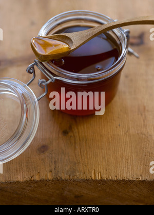 Le miel en kilner pot avec cuillère en bois - haut de gamme image numérique Hasselblad 61Mo Banque D'Images