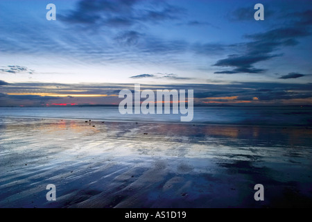 Coucher du soleil à printemps Longniddry Bents, East Lothian, en Ecosse. Banque D'Images