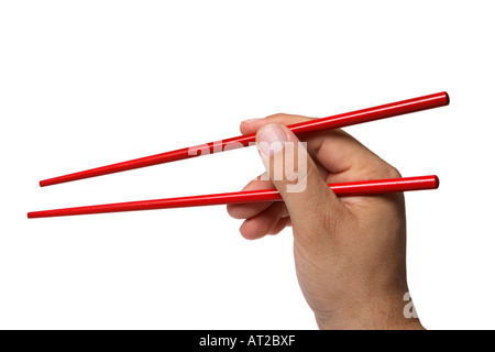 Hand Holding Chopsticks Banque D'Images