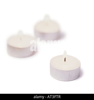 La combustion de 3 bougies chauffe-plat Banque D'Images