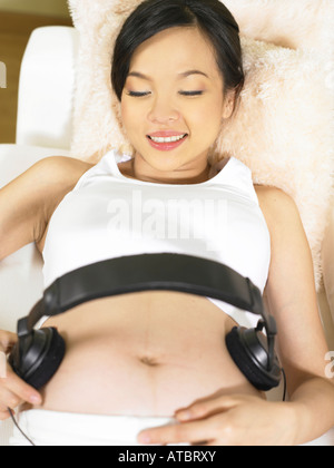 Top View of woman with headphones Banque D'Images