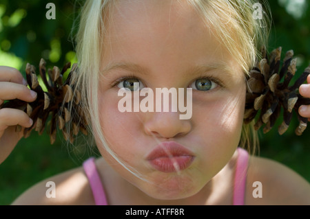 A girl pulling faces Banque D'Images