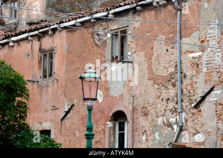 Les bâtiments et les habitants de l'île de Murano Venise Italie Banque D'Images