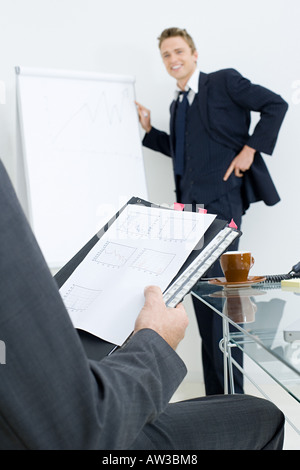 Businessman giving presentation Banque D'Images