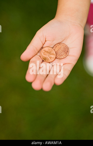 Libre de penny dans palm childs Banque D'Images