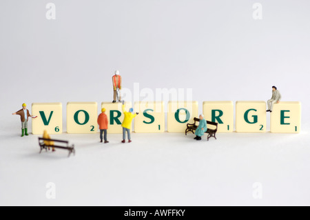 Photo symbolique, de précaution, de tuiles de SCRABBLE Banque D'Images