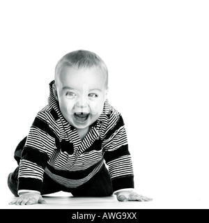 Smiling baby boy ramper. Banque D'Images