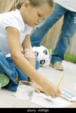 La peinture en plein air de fille Banque D'Images