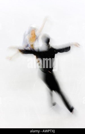 Action de paires floue patineurs Banque D'Images