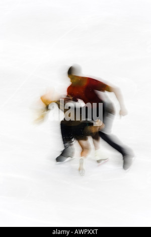 Action de paires floue patineurs Banque D'Images