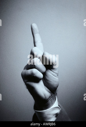 Part, l'index pointant vers le haut Banque D'Images