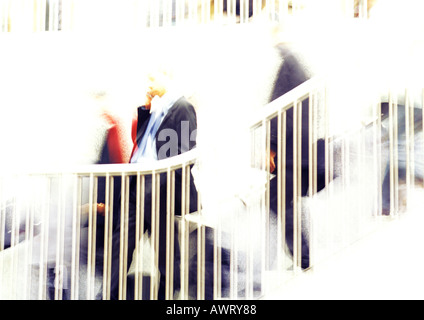 Businessman on escaliers, blurred Banque D'Images