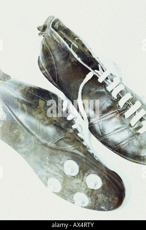 Chaussures de football noir vintage photo-illustration Banque D'Images