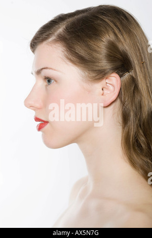 Profil de jeune femme, lèvres rouge Banque D'Images