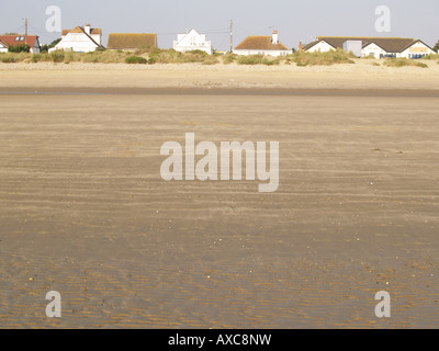 Rivage de sable sable ondulations canal humide plage modèle St Mary's Bay kent Banque D'Images