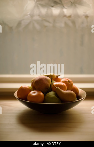 Bol de fruits oranges pommes poires banana Banque D'Images