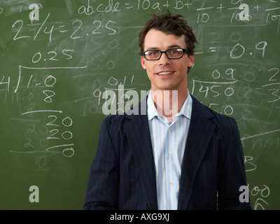 Teacher in front of Blackboard Banque D'Images