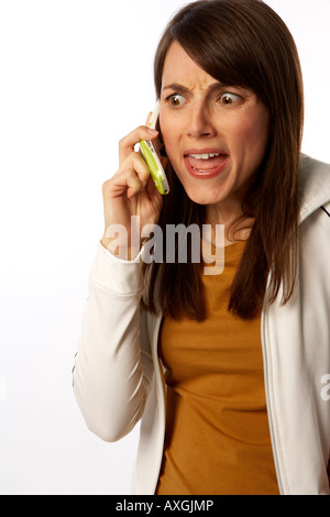 Femme ennuyés on Cell Phone Banque D'Images