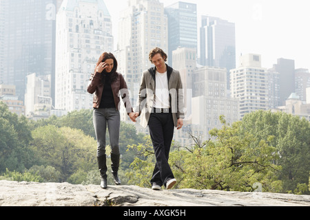 Couple Walking in City Park, New York City, New York, USA