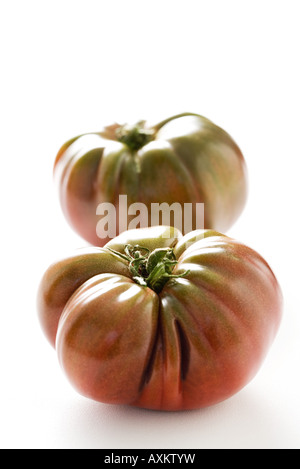 Deux heirloom tomatoes, close-up Banque D'Images