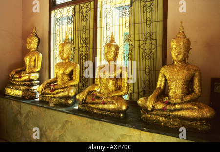 La feuille d'or couverts assis Bouddhas Temple du Bouddha d'or Traimit Trimitr Witthayaram Asia Bangkok Thaïlande Banque D'Images