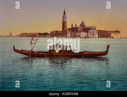 Gondola avec vue de l'Isola di San Giorgio Maggiore à l'aube Banque D'Images