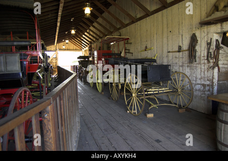 Wagon et stage coach affichage à la mission de San Juan Bautista State Park CA USA Banque D'Images