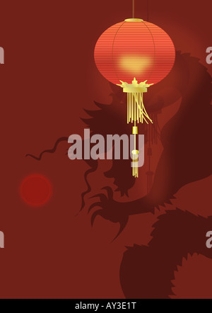 Ombre d'un dragon sur le mur avec une lanterne en face d'elle Banque D'Images