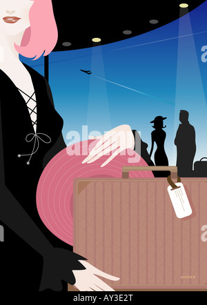 Close-up of a woman holding luggage at an airport lounge Banque D'Images