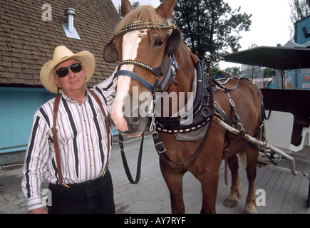 MR 0347 Jimmy Jeter donne à cheval et des promenades en buggy à la rue au centre-ville de festival, les joueurs de Ruidoso, Nouveau Mexique. Banque D'Images