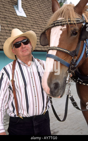 MR 0347 Jimmy Jeter donne à cheval et des promenades en buggy à la rue au centre-ville de festival, les joueurs de Ruidoso, Nouveau Mexique. Banque D'Images