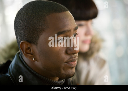 Close-up of a young contemplative couple inter-raciale Banque D'Images