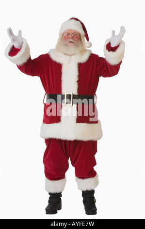 Santa Claus with arms raised Banque D'Images