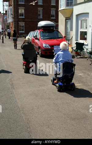 Les personnes âgées sur triporteur motorisé Banque D'Images