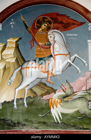 Saint George spearing lancinantes le Dragon mal illustration ancienne église des sentiers à Tissiniva Crete island Grèce Banque D'Images