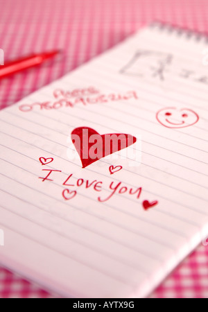 Je t'aime coeur scribble sur pad avec stylet Banque D'Images