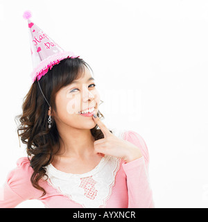 Smiling woman with a culminé hat sur Banque D'Images