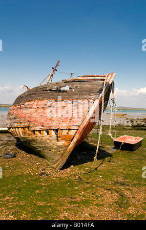 La location de bateau à l'abandon, West Mersea, Essex. Banque D'Images