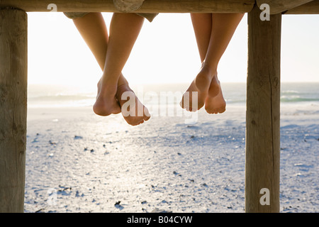 Pieds nus et une jetée Banque D'Images